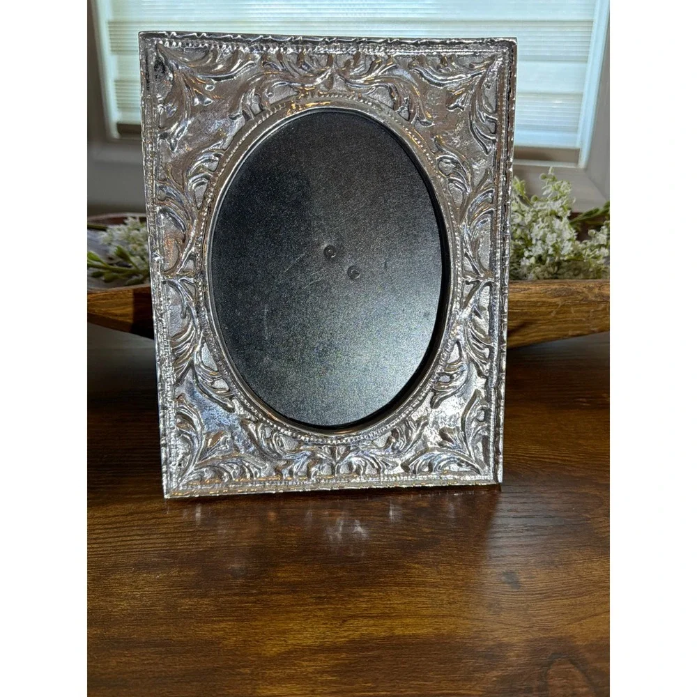 Vintage Ornate Silver Embossed Picture Frame Oval Opening Scrollwork Tabletop